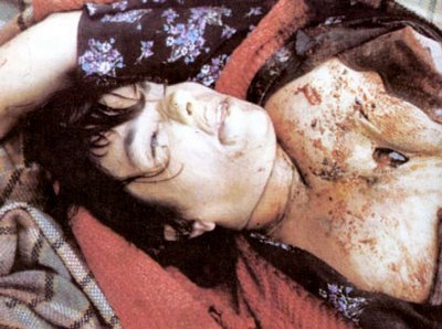 The body of Bosnian Serb civilian Kostadinka Grcic, executed by Bosnian Muslim forces by stabbing her in the chest.