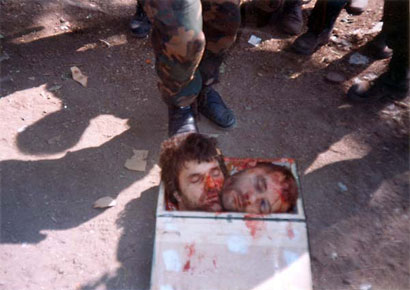 Photo 1)Saudi/Afghan-Arab mujahedeen with decapitated heads of Bosnian Serb POWs in 1992. Al-Qaeda funded and organized these early terrorist attacks against Bosnian Serbs.