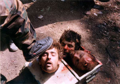 Photo 2)Saudi/Afghan-Arab mujahedeen with decapitated heads of Bosnian Serb POWs in 1992. Al-Qaeda funded and organized these early terrorist attacks against Bosnian Serbs.