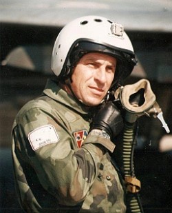 Миленко Павловић је рођен 5. октобра 1959. године у Горњем Црниљеву. Завршио је војну гимназију „ Маршал Тито" у Мостару упркос противљењу родитеља да изабере позив пилота. Ваздухопловну академију завршио је у Задру. Командант 204 ловачко авијацијског пука постао је 1998. Погинуо је 4. маја 1999. Иза њега су остали супруга и два сина.
